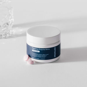 White and navy blue jar of Zenwise Digestive Enzyme Mints with berry flavor, 60 tablets, sitting on white surface
